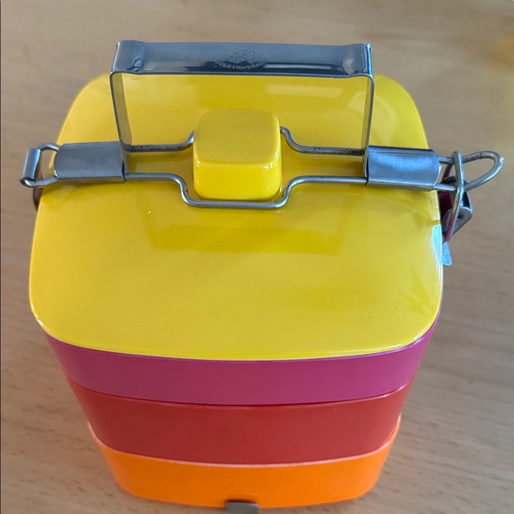 Vintage Three tier Bento Lunch Box with metal carrying handle.